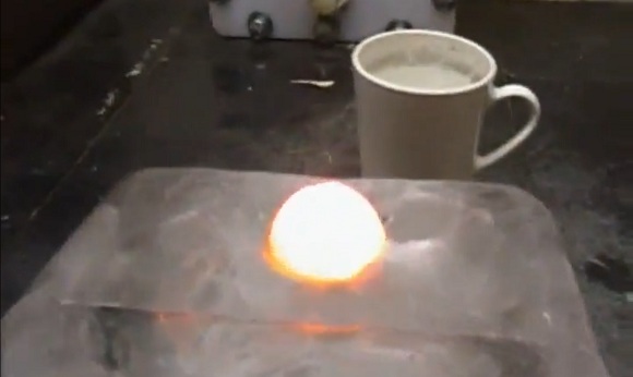hot nickel ball through ice block