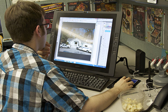 man working on computer