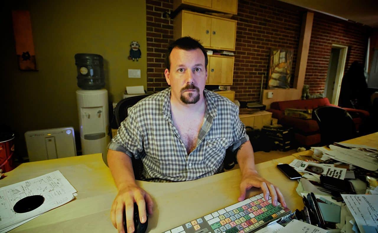 man working at computer