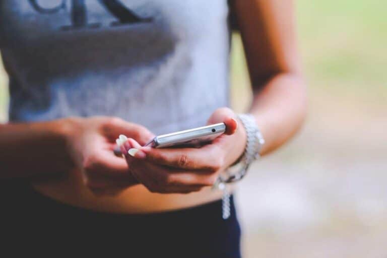 woman holding mobile phone