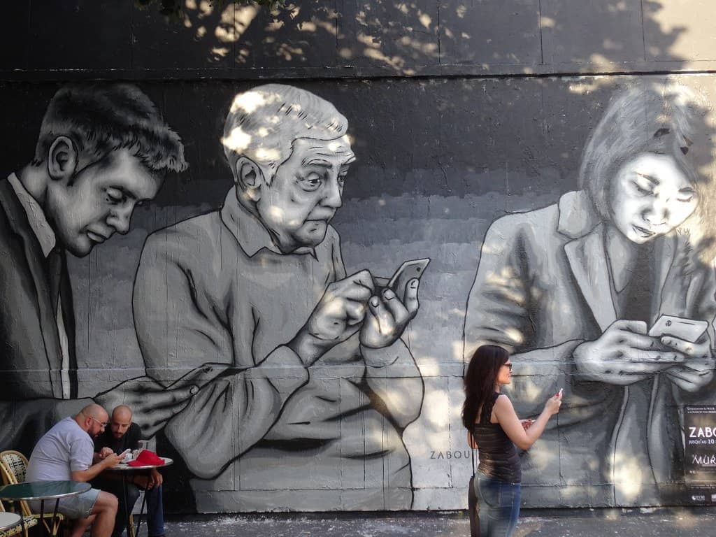 people on their phones