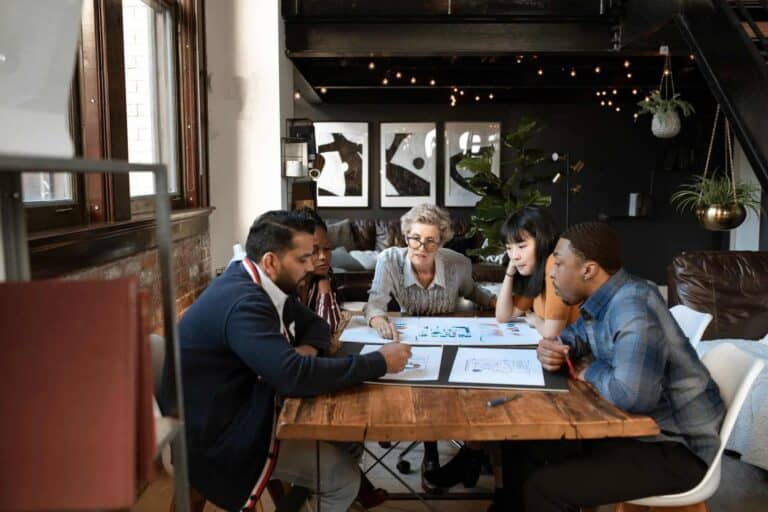 people having a meeting at restaurant