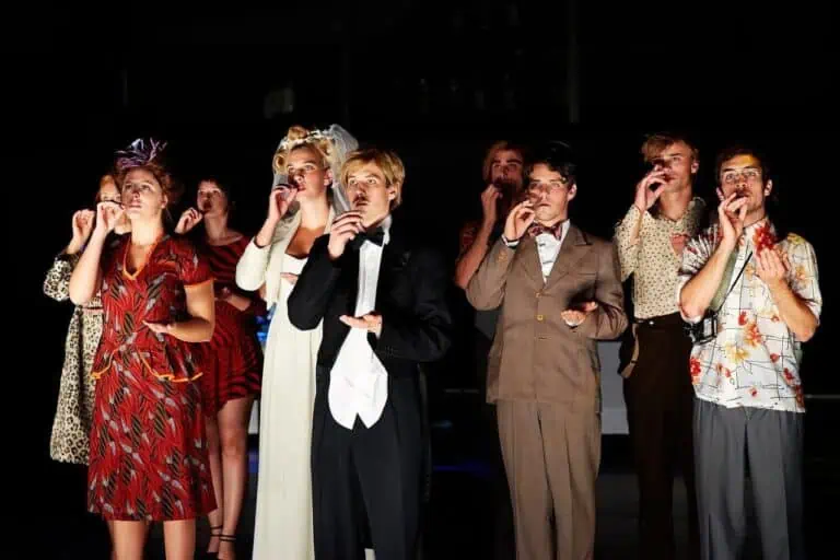 people acting on stage