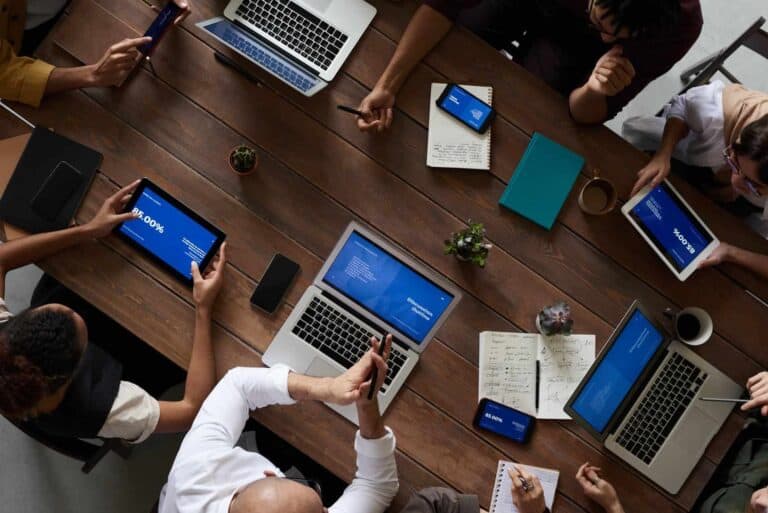 people typing on computers