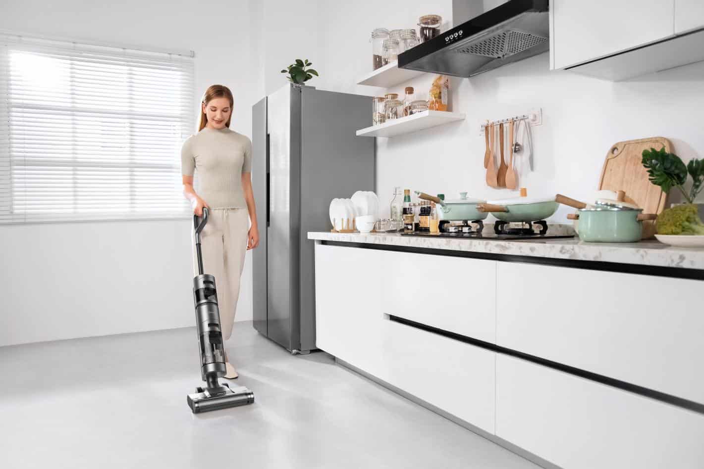 dreametech woman vacuuming