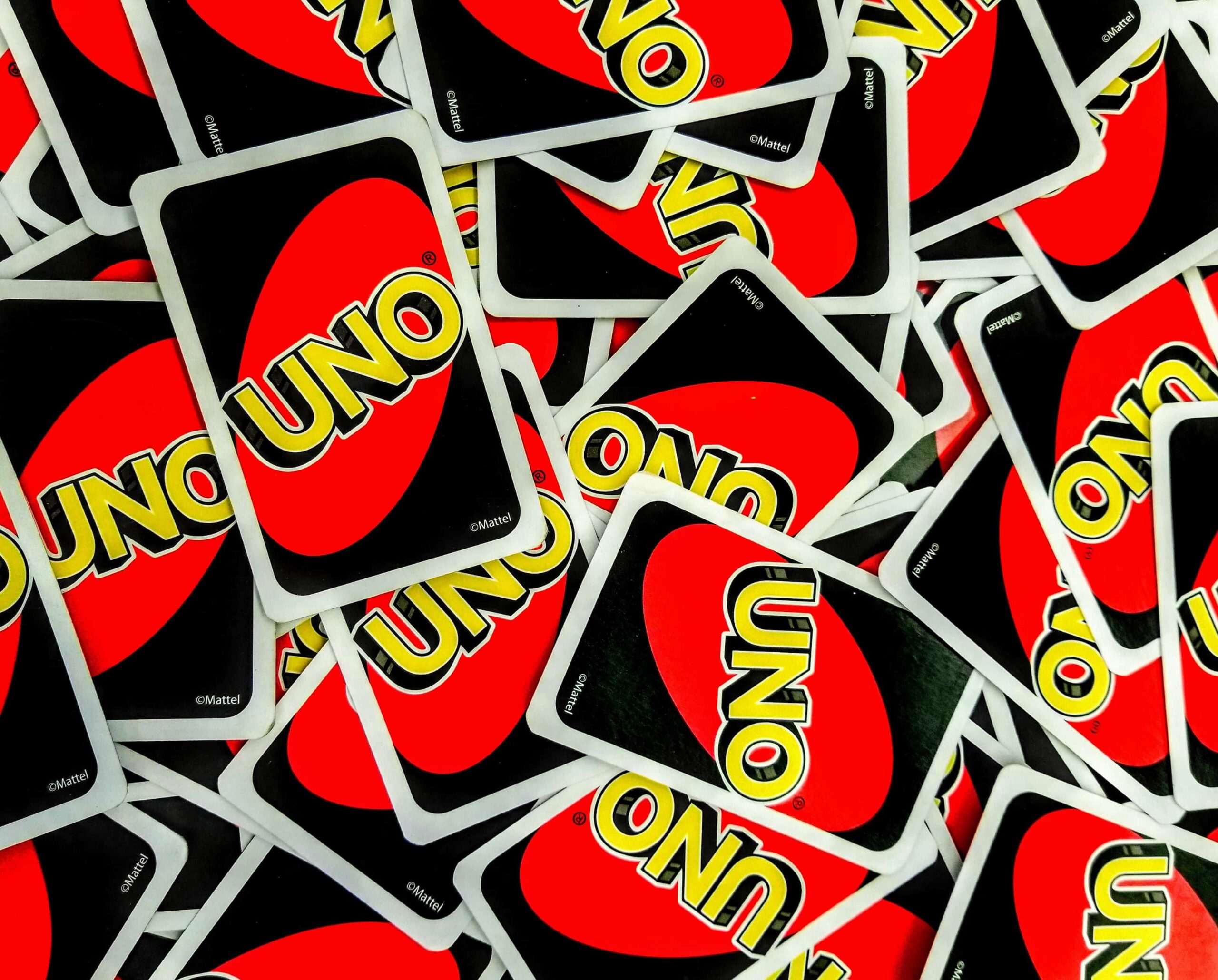 What Does The Shuffle Hands Card Mean In UNO? 2 sparks reliance 0DF7DuMrI9k unsplash scaled