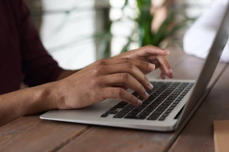 typing on a laptop