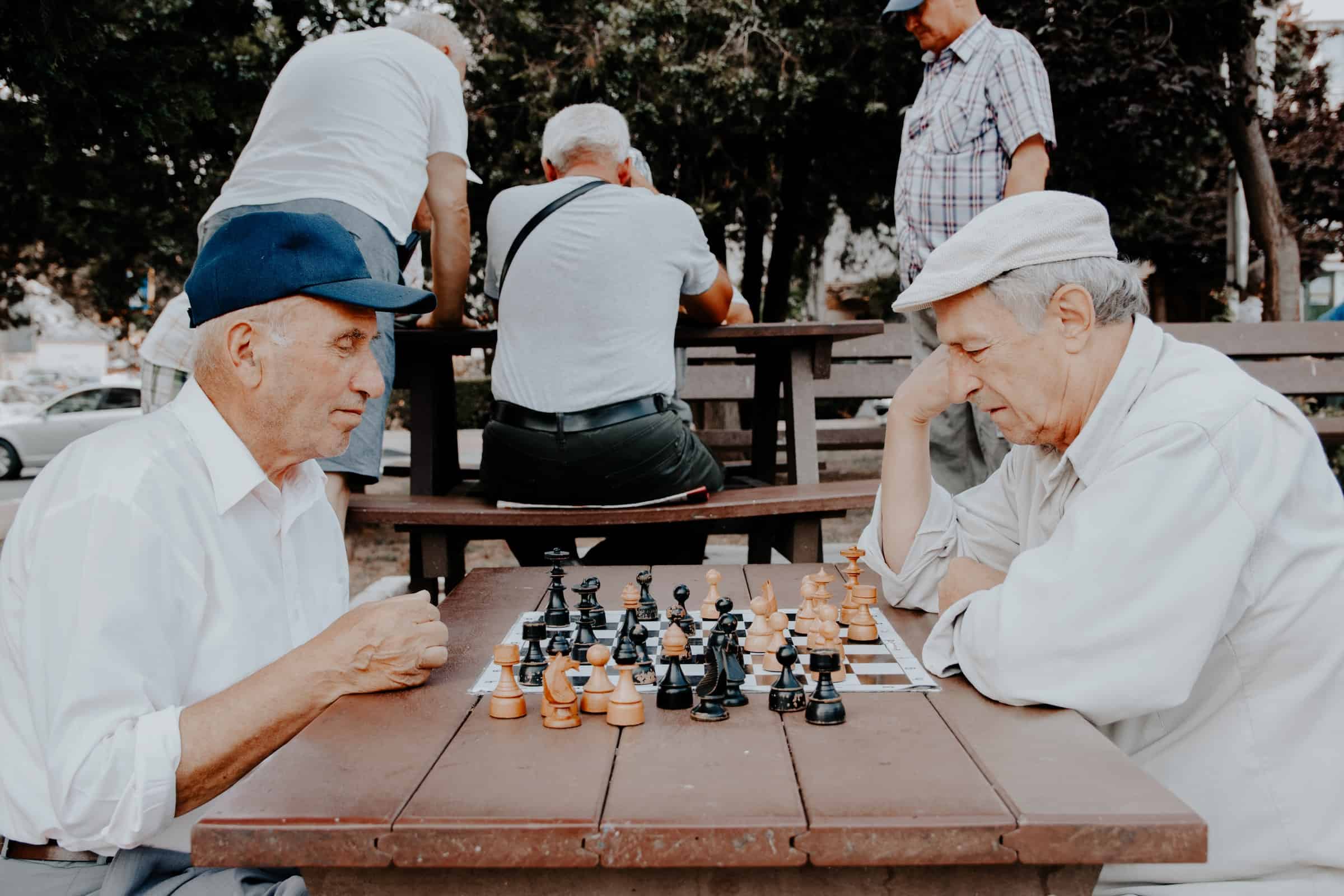 old men palying chess
