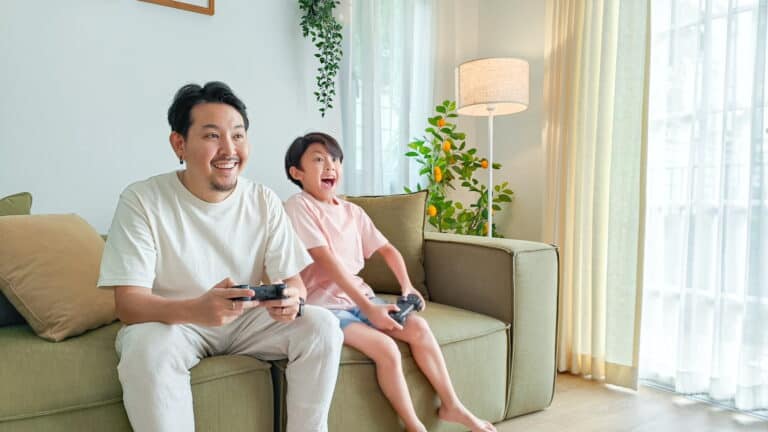 happy father son gaming