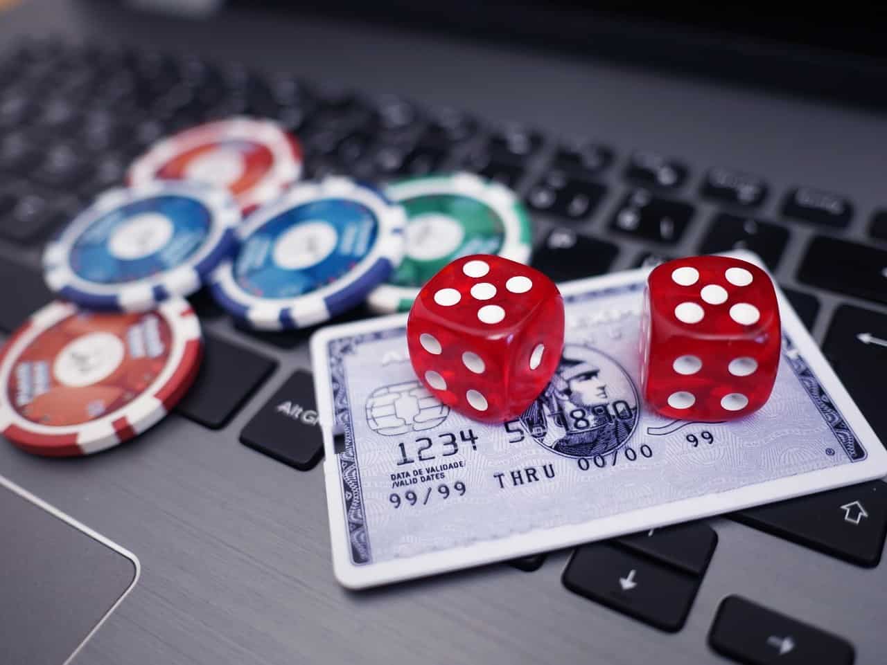 The Most Influential Software Providers in the Online Casino Industry 2 dice and poker chips on a credit card