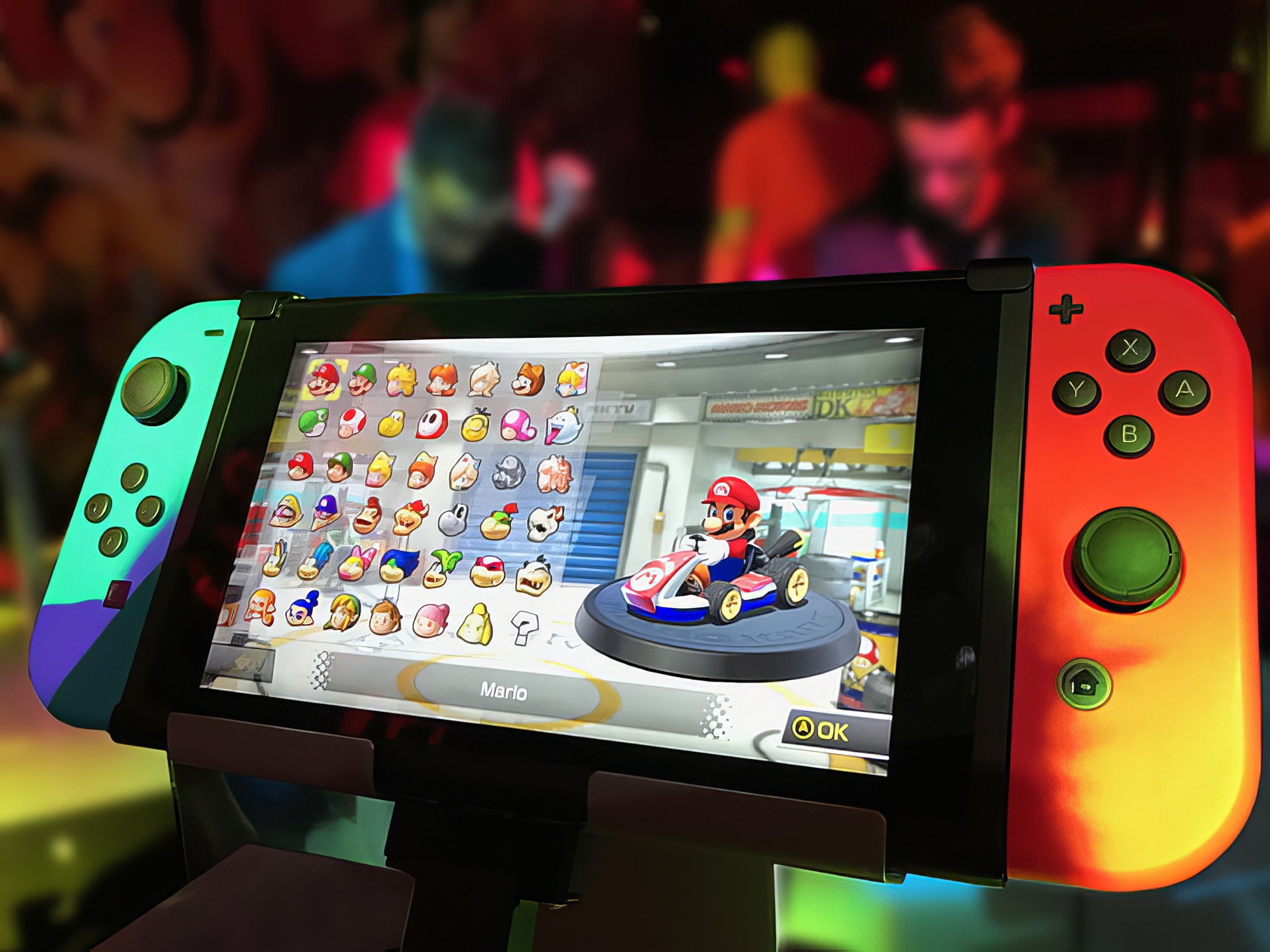 A relaxed teenage boy enjoys playing Nintendo Switch on a cozy couch, showcasing a genuine smile and casual attire. Free Nintendo Switch Games 3