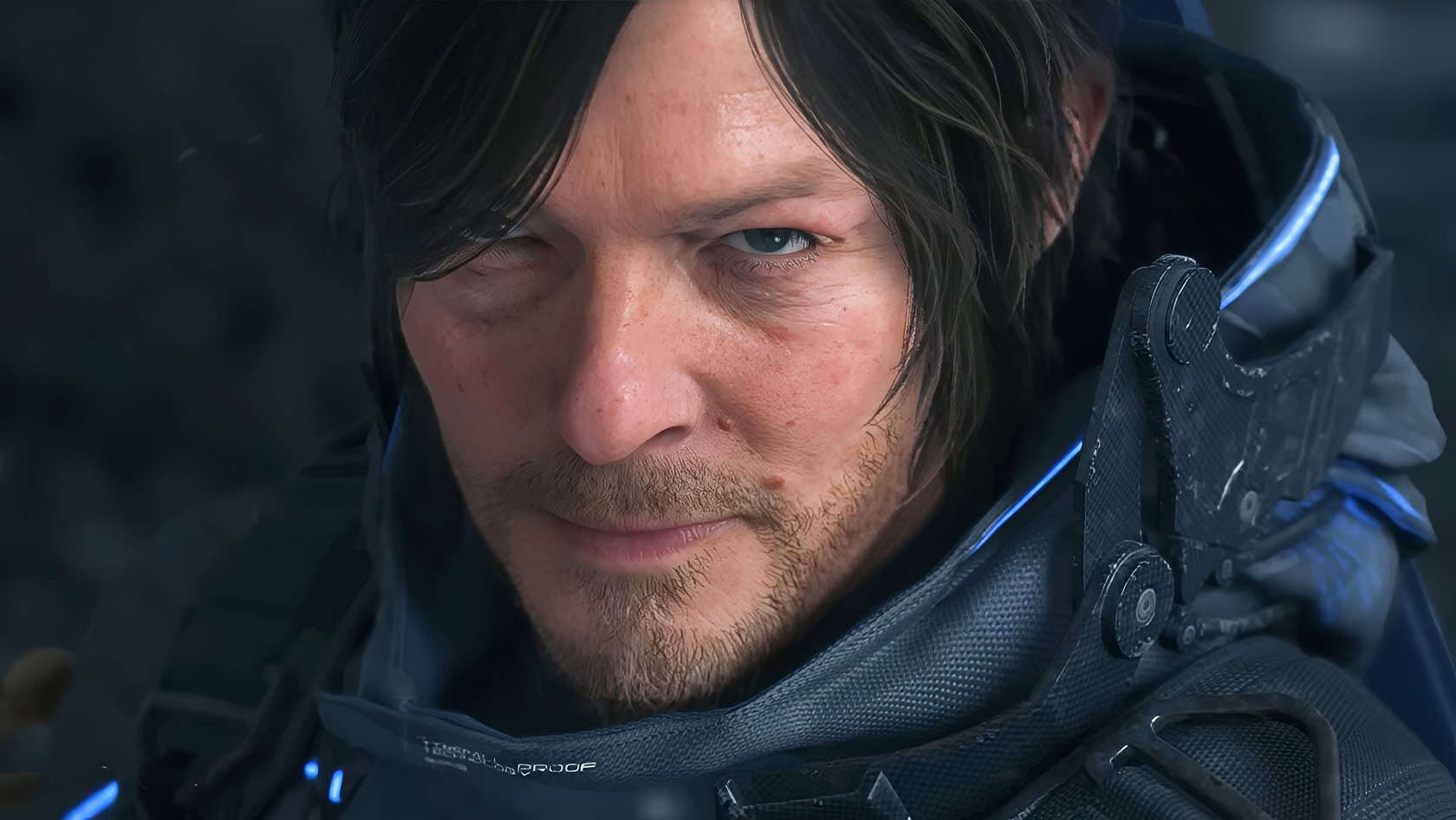 A weathered man stands in a desolate landscape, clutching a worn journal amidst crumbling structures and sparse vegetation. Death Stranding 2 4
