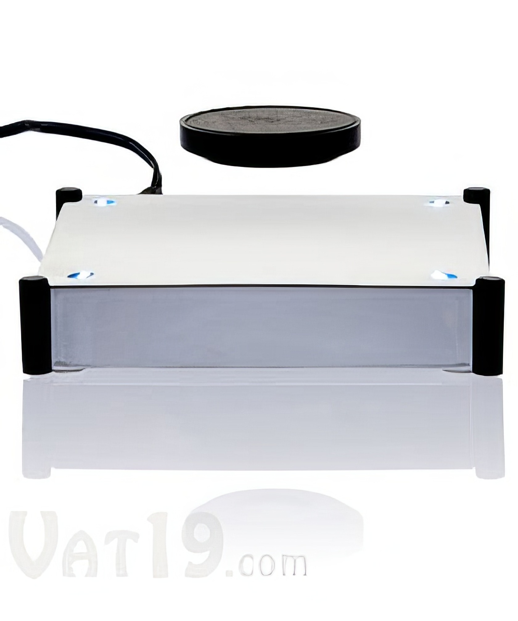Levitron Revolution Ez Float: The Magical Floating Device 6 High-precision electronic scale for weight measurement, featuring a compact design with a round black sensor on top, suitable for laboratory or industrial use.