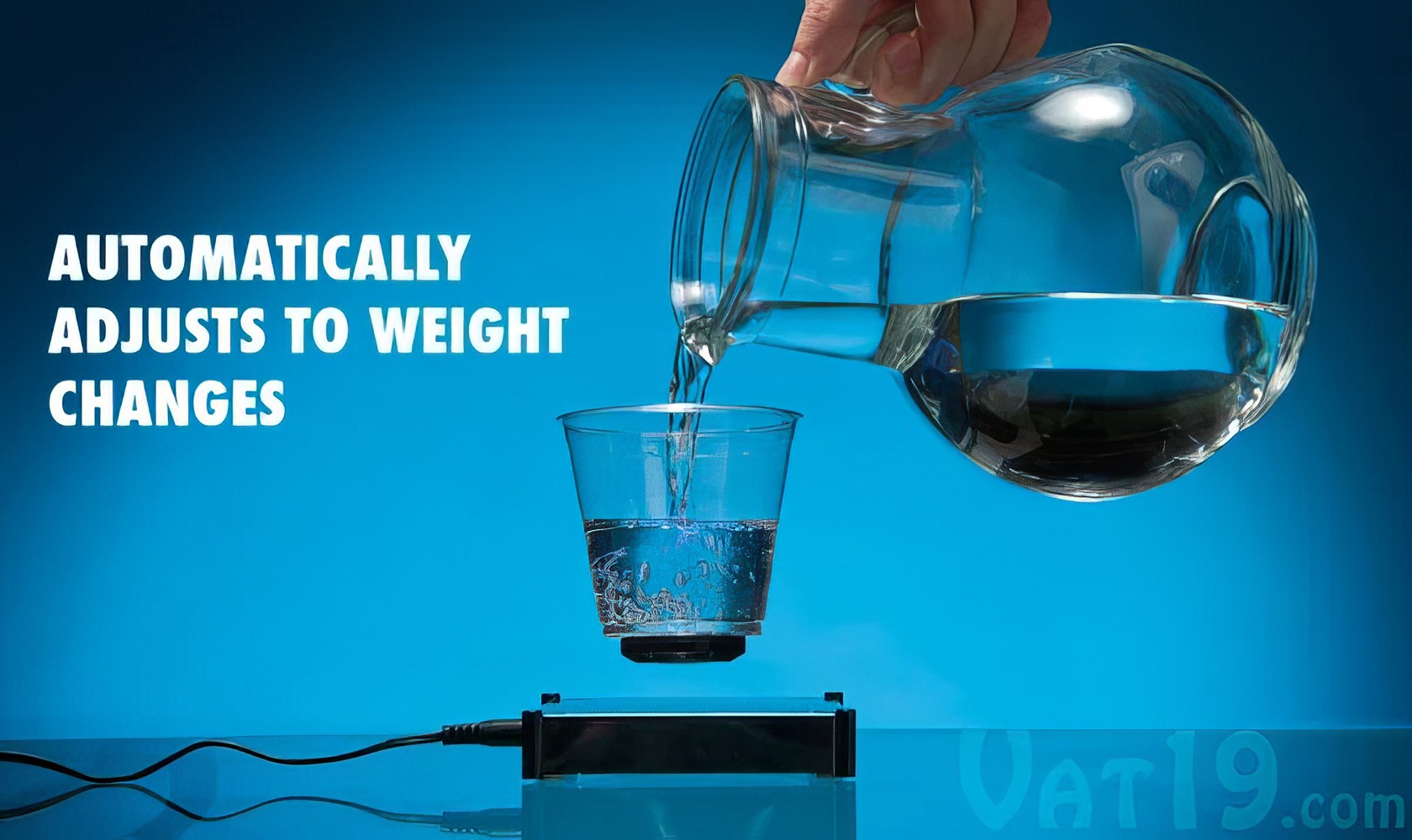 Levitron Revolution Ez Float: The Magical Floating Device 2 Effortless water pouring into a glass from a large pitcher, demonstrating automatic weight adjustment technology for optimal pouring precision.