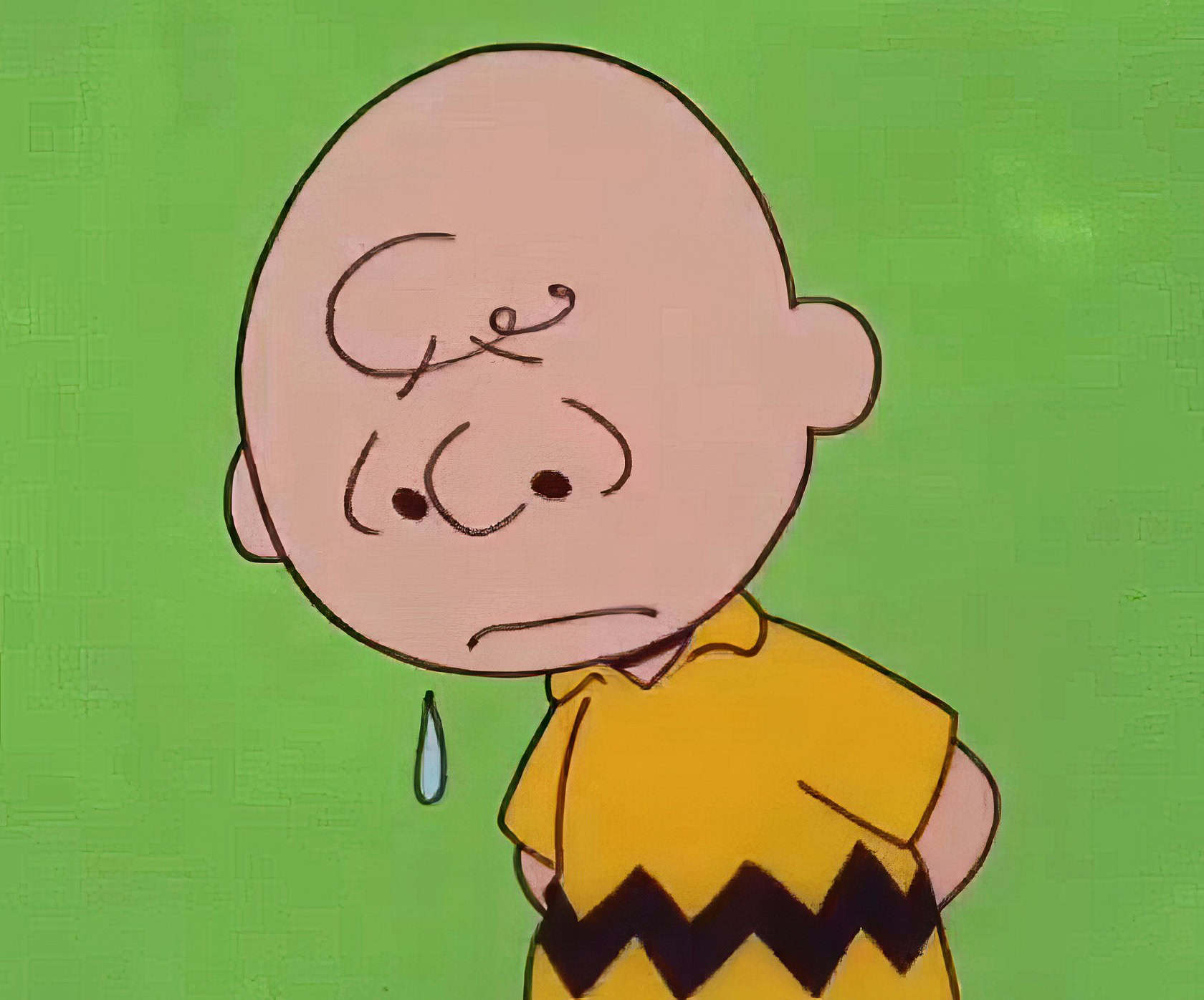 Depression in Cartoons: 12 Key Lessons from Eeyore to BoJack 7 Sad Charlie Brown cartoon image with a tear, depicting emotional expression and relatable feelings.