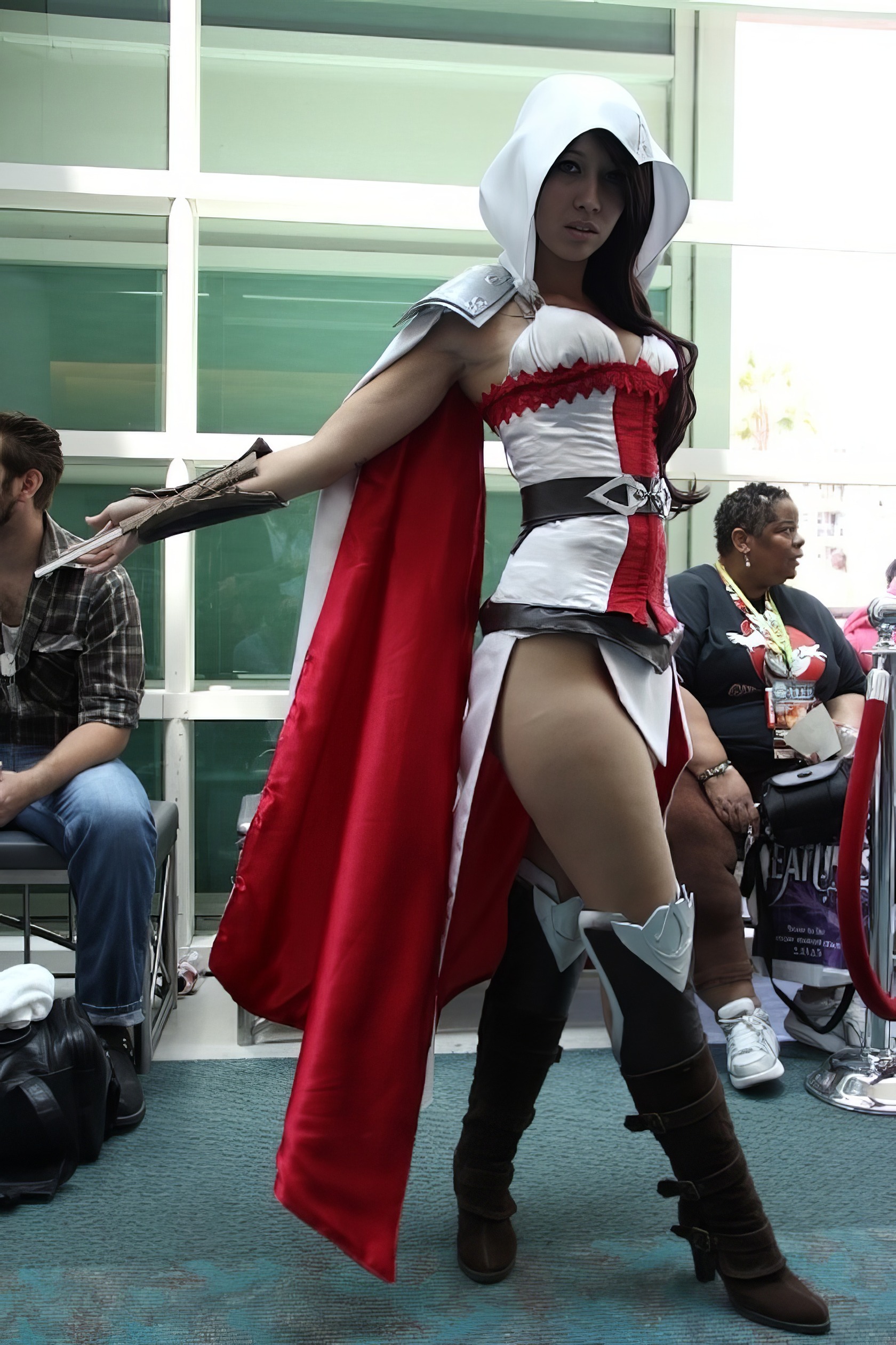 Assassin's Creed Hot Cosplay: 20+ Character Costumes & DIY Tips 8 Assassin's Creed cosplay fantasy warrior woman at a convention.