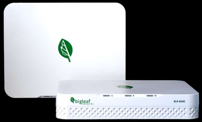 Wireless networking device featuring green leaf logo emphasizing eco-friendly technology.