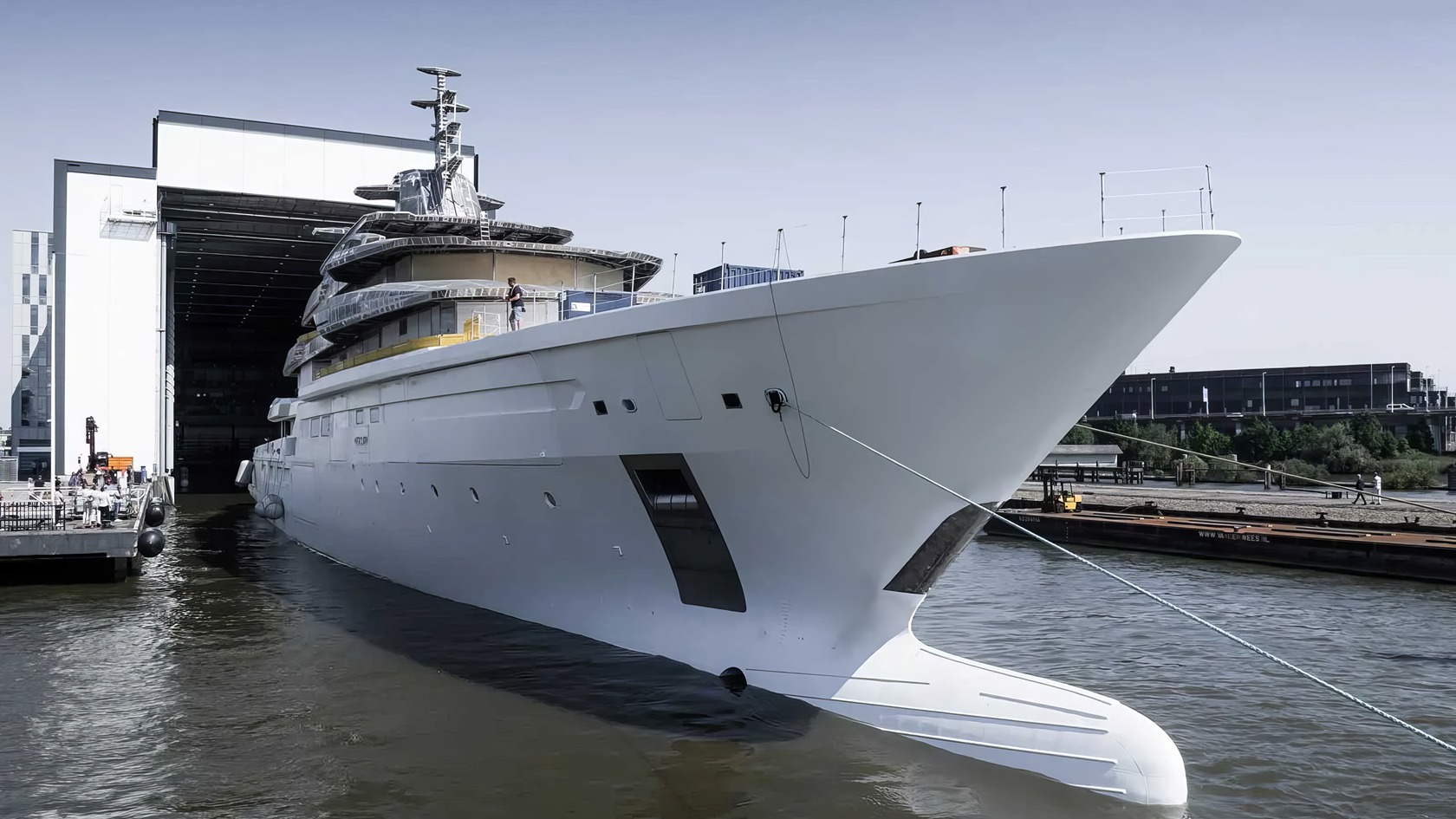 Gabe Newell's Superyacht: 5 Bold Ideas Behind Leviathan 2 Luxury yacht docked at modern marina, featuring sleek design and advanced technology for high-end leisure and entertainment.
