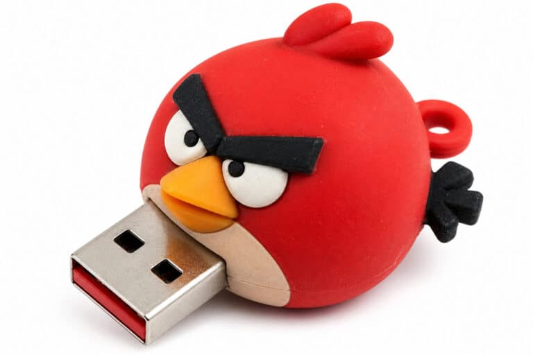 Angry Bird-themed USB flash drive with a red bird design, featuring an angry expression and black eyebrows, ideal for data storage and transfer.
