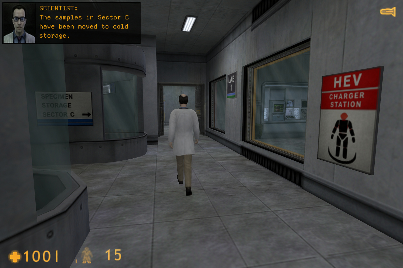 Half-Life: Blue Shift: How a Cancelled Dreamcast Port Defined a Legacy 5 Interior view of a science laboratory with a scientist walking through a cold storage area, featuring HEV charger station and scientific equipment.