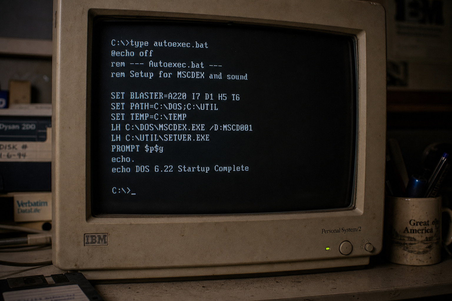 What Is Casual Gaming? From DOS Memory Edits to Candy Crush 3 Close-up of an old IBM computer monitor showing DOS startup screen with command prompt and system information.