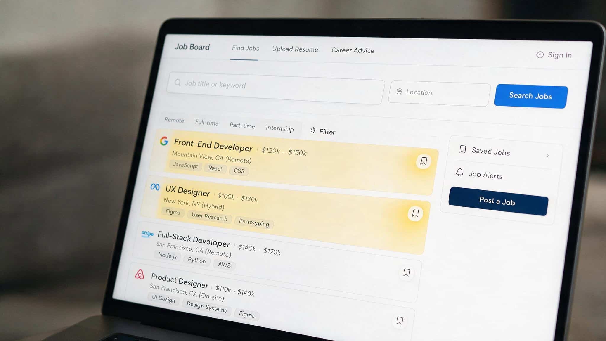 Web Designer vs Web Developer: BLS Salary Data Flips the Script 3 Job board on a laptop screen displaying web developer and web designer specialization titles