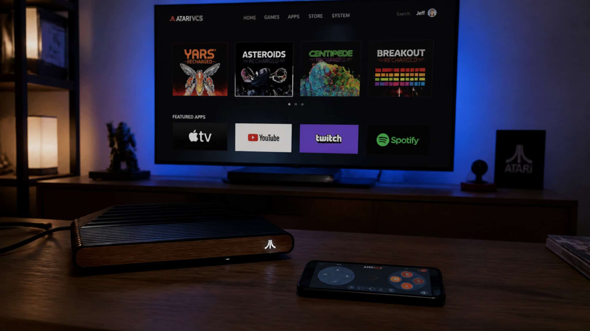 AirConsole Review: What It Is, How It Works, and Whether the Free Games Are Worth Your Time 3 Atari VCS console connected to a TV with a smartphone used as an AirConsole controller