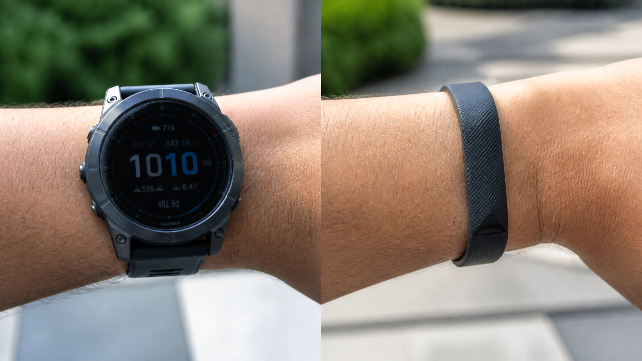 Close-up of a smartwatch and fitness band worn on a person's arm outdoors, showcasing wearable technology for health and fitness tracking.