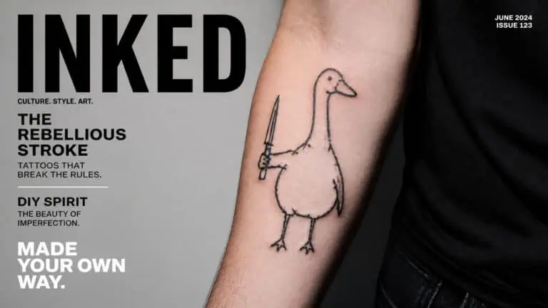 Minimalist tattoo of a dodo bird holding a sword on a person's arm, symbolizing rebellion and DIY spirit.