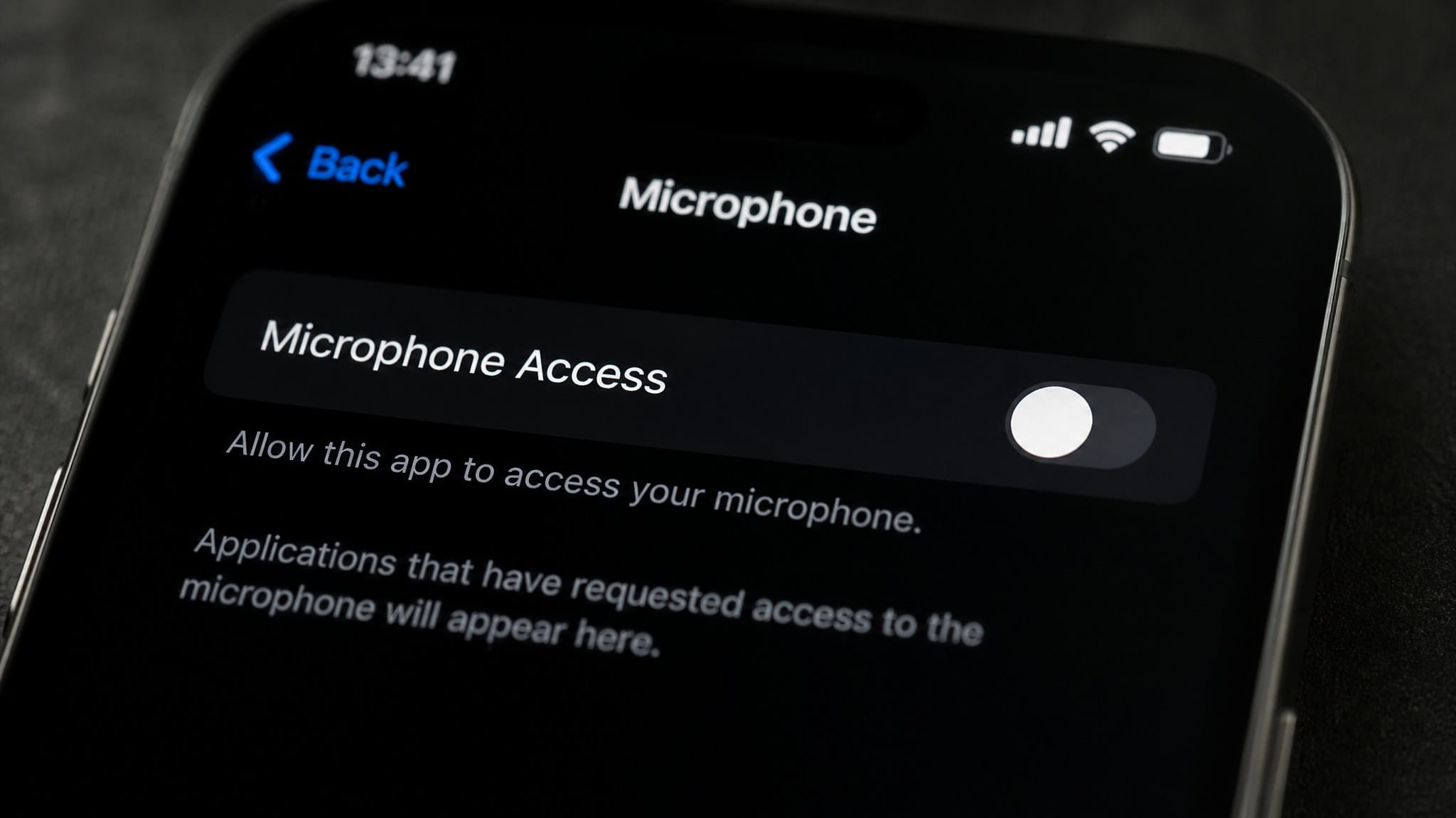 How Phone Microphone Access Works: The Wake-Word Truth 2 Smartphone settings screen with microphone permission toggle turned off.
