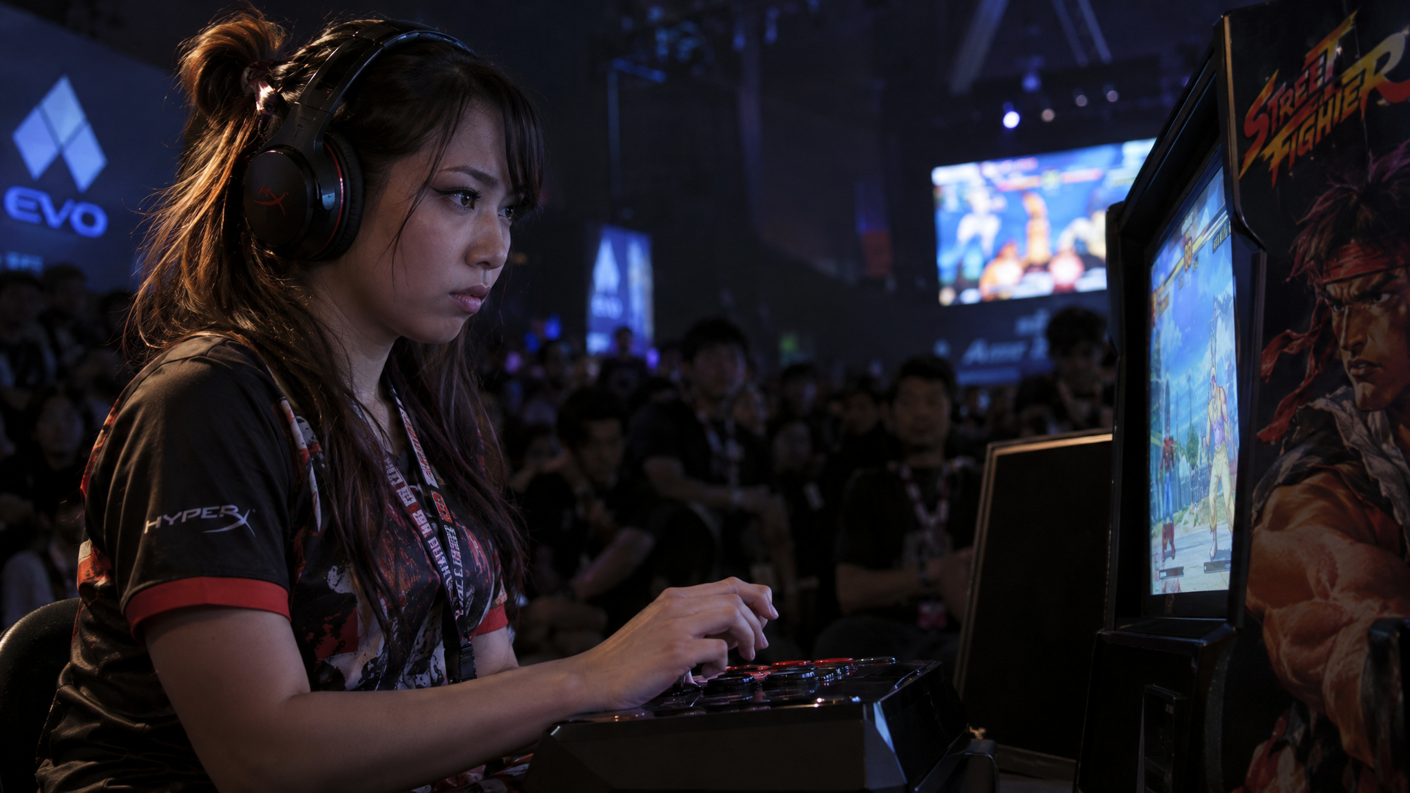 Best Female Esports Players of All Time: Ranked by Earnings, Titles, and Era 3 Ricki HelloKittyRicki Ortiz competing offline at a Street Fighter tournament playing Chun-Li